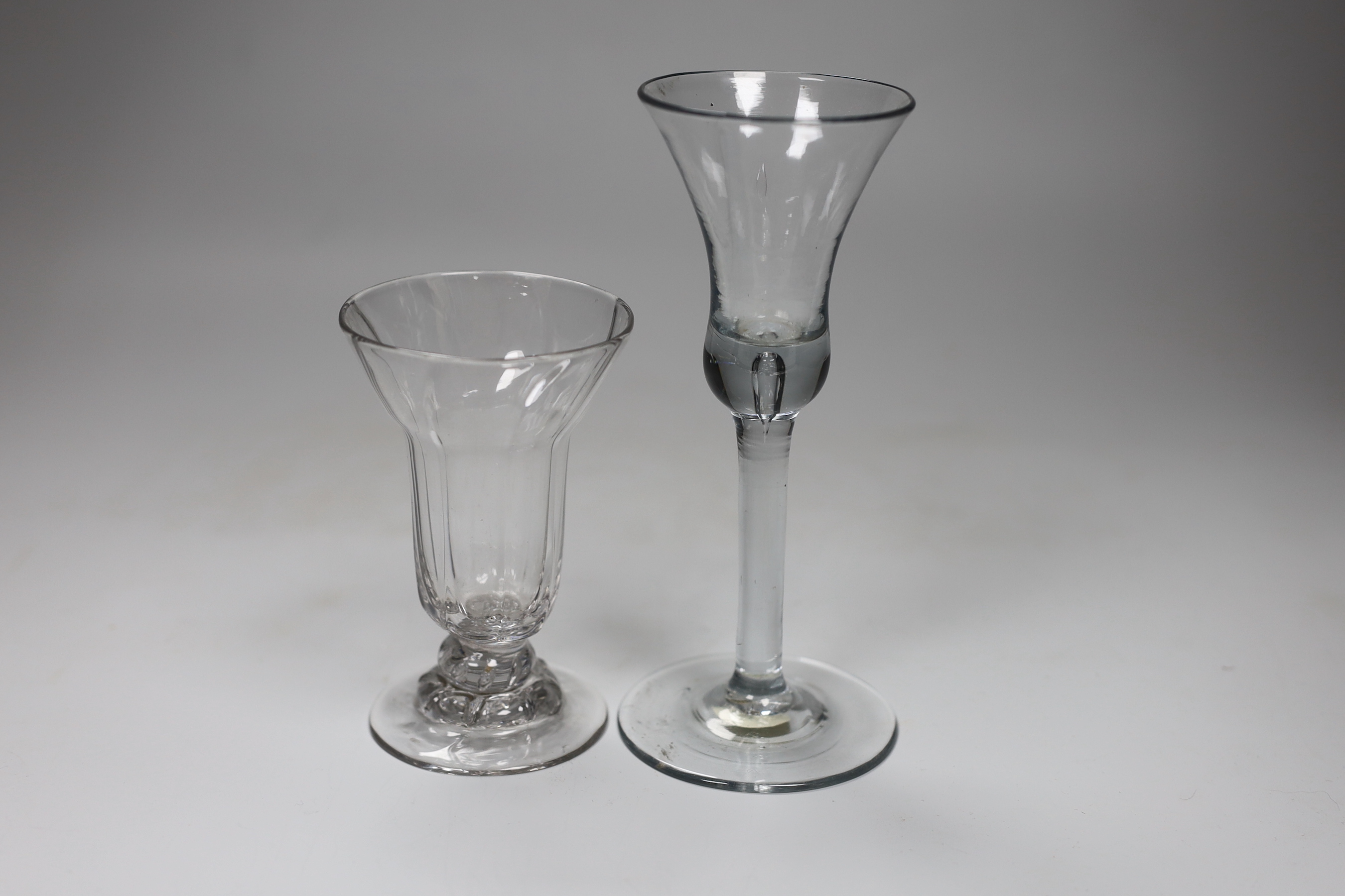 A George II wine glass, bell bowl with air-tear, and a George II syllabub glass, tallest 16cm